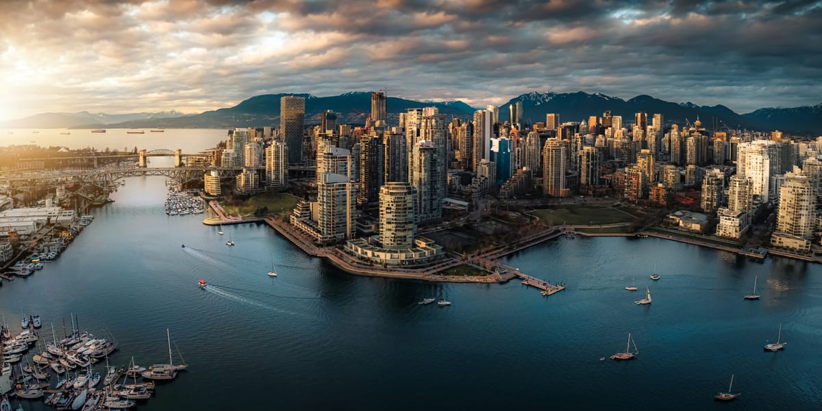 A daytime aerial shot of Vancouver's skyline from False Creek